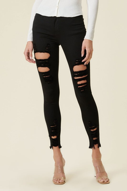 High Rise Distressed Skinny Jeans with a Raw Hem
