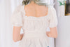 White Puff Sleeve Tunic with Ruffle Trim and Bow Details