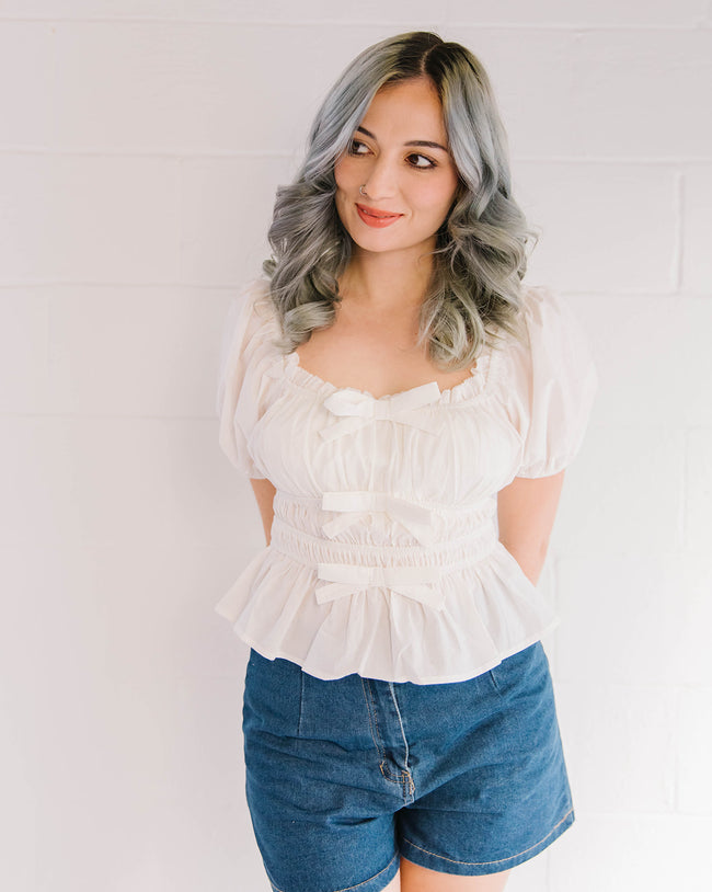 White Puff Sleeve Tunic with Ruffle Trim and Bow Details