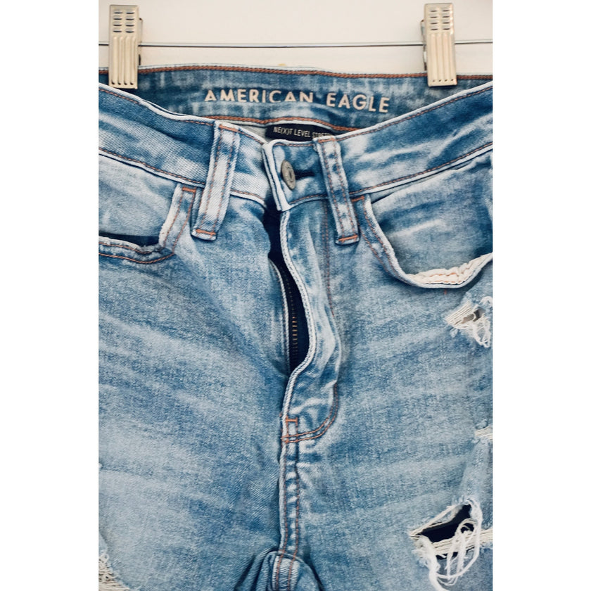 American Eagle Medium Wash Super Hi-Rise Distressed Jeggings Size 00