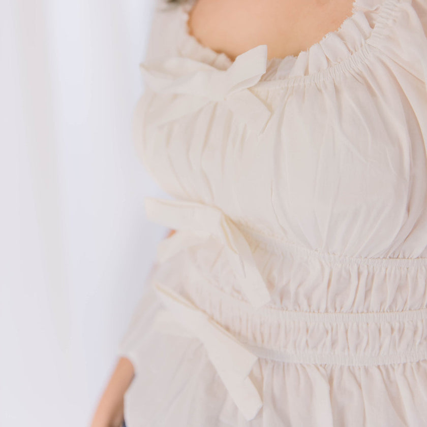 White Puff Sleeve Tunic with Ruffle Trim and Bow Details