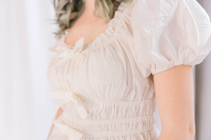 White Puff Sleeve Tunic with Ruffle Trim and Bow Details