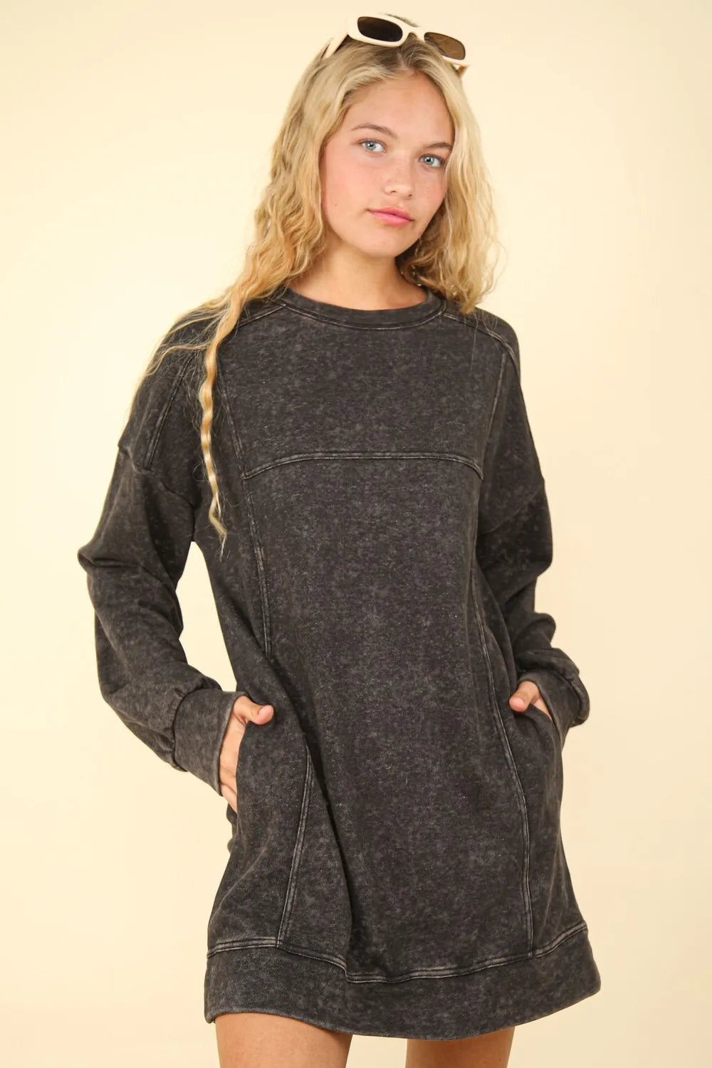 Cozy and chic long-sleeve sweatshirt dress for a trendy, relaxed fit.