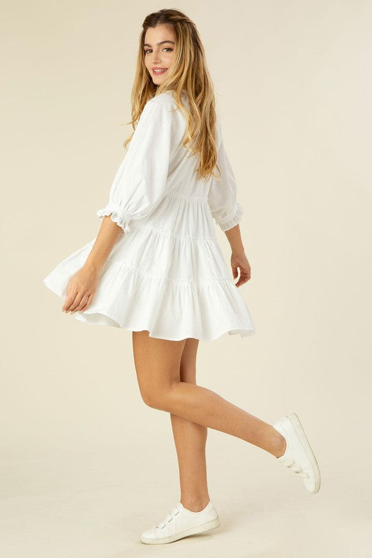 Tiered mini dress with tassel